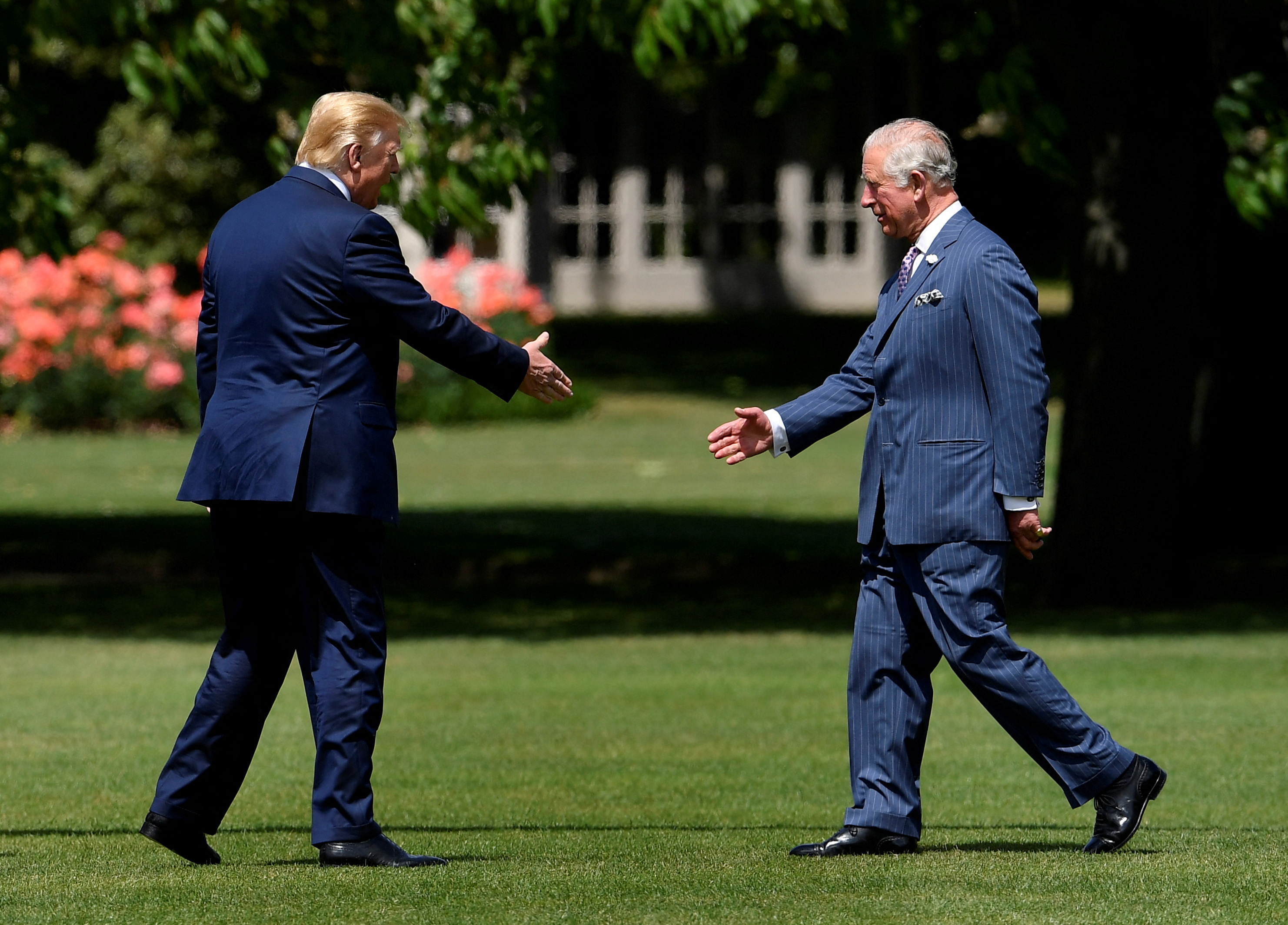 President Trump shaking hands with Prince Charles at Buckingham Palace.