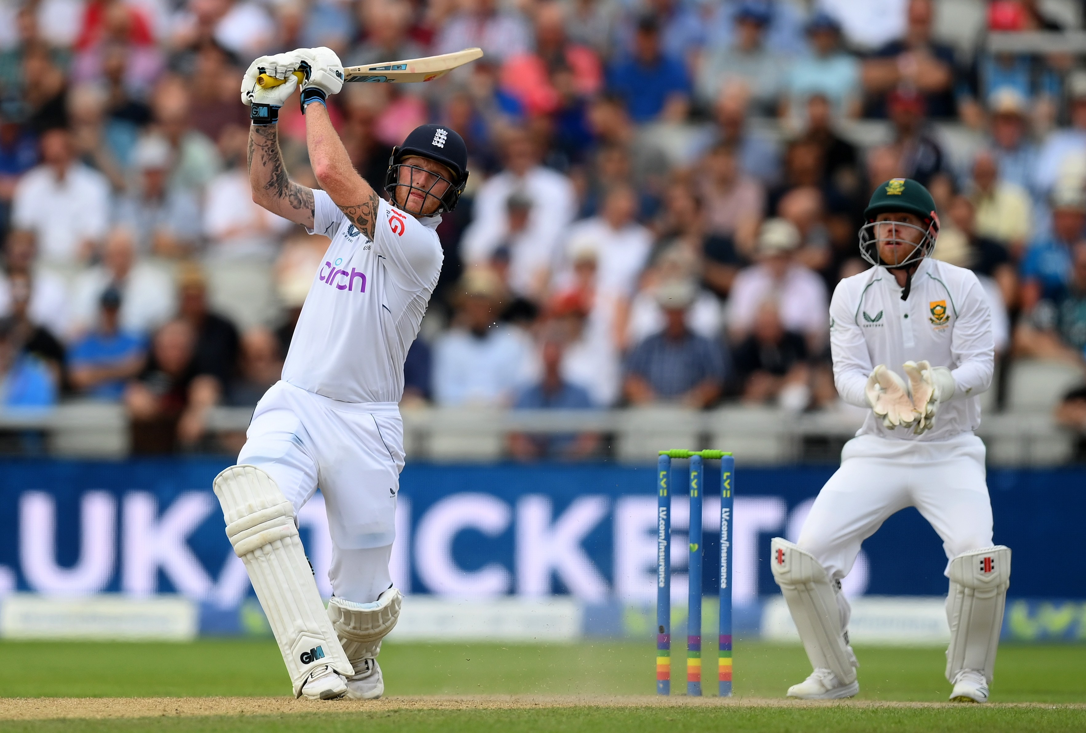 Ben Stokes of England hitting a six during a cricket match.