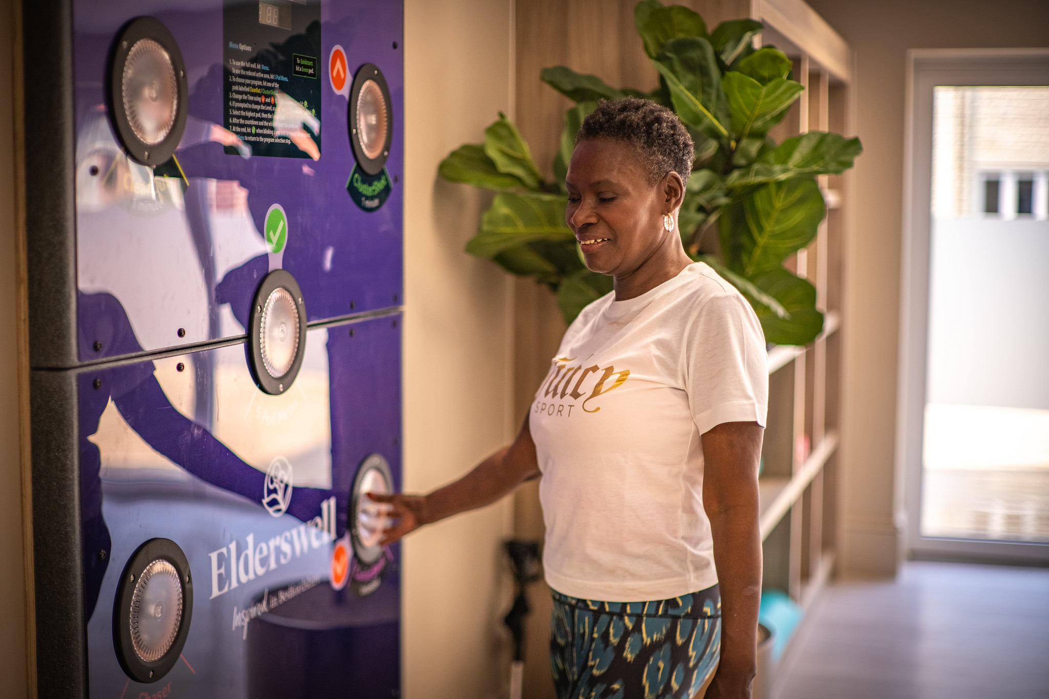 Woman using cardio equipment.