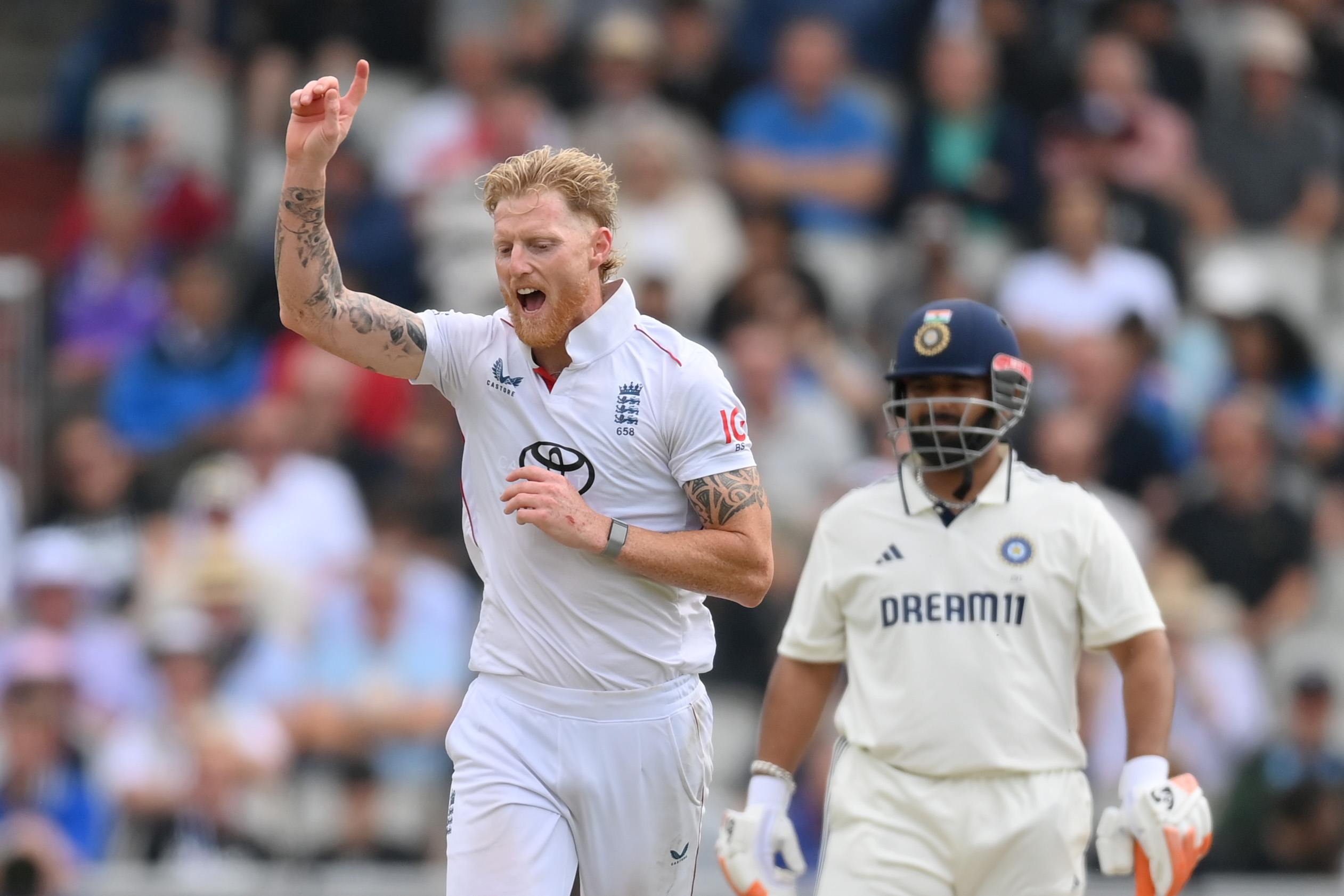 Ben Stokes celebrates taking a wicket during an England vs. India cricket match.