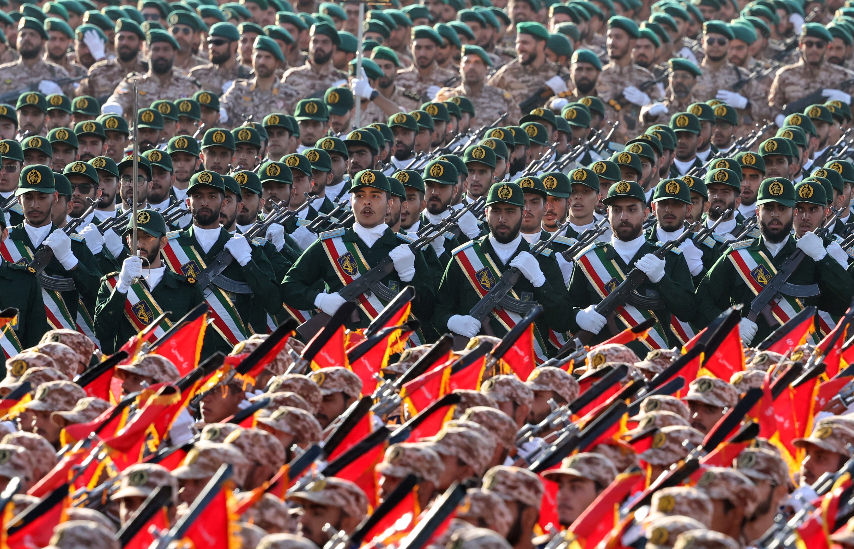 Iranian Revolutionary Guard Corps soldiers marching in a military parade.