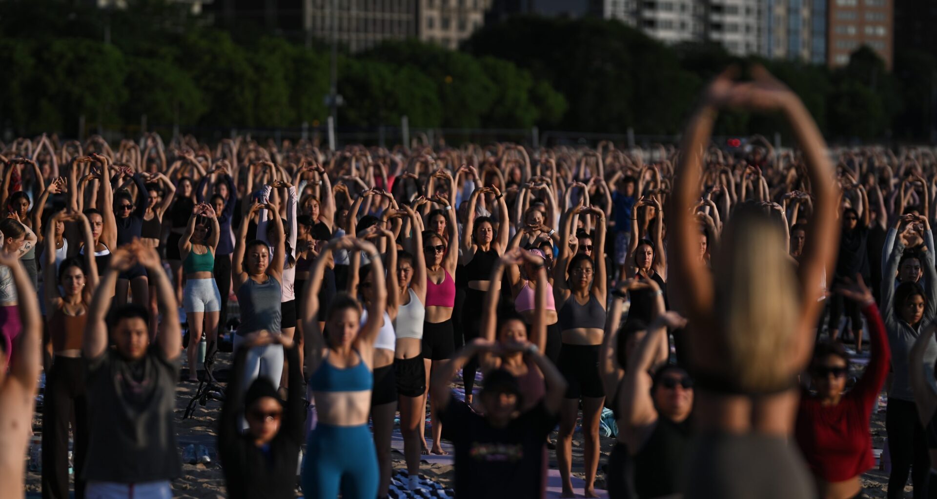 How A Free Pilates Class Took Over Oak Street Beach