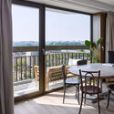 Opportuna Residential Tower  / Office Winhov + Office Haratori - Interior Photography, Dining room, Wood, Glass, Chair, Balcony