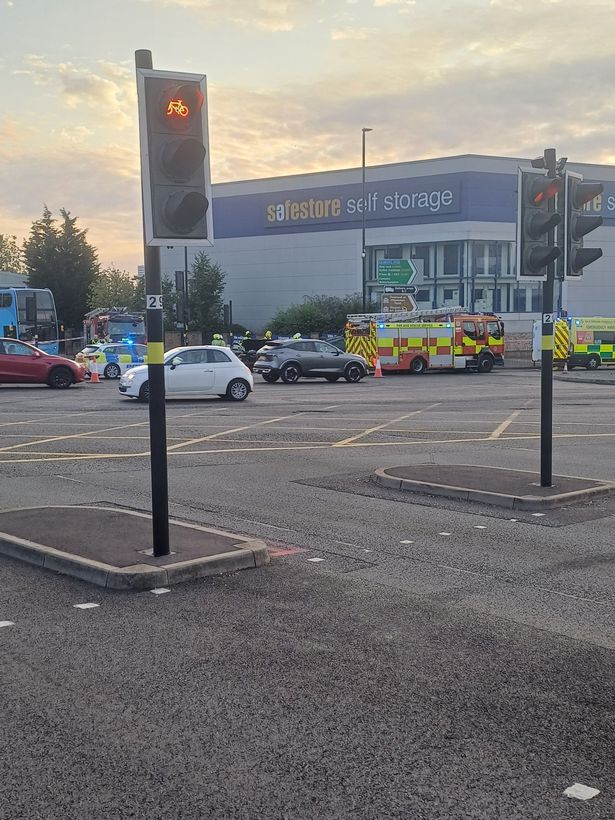 The crash took place near the Safestore Self Storage unit in Newtown at the junction of New Town Row and the A4540 New John Street West, with police, fire and ambulance vehicles pictured at the scene 