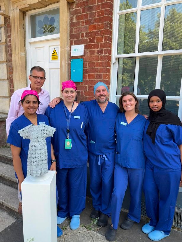 Staff at CREATE Fertility Bristol with the statue.