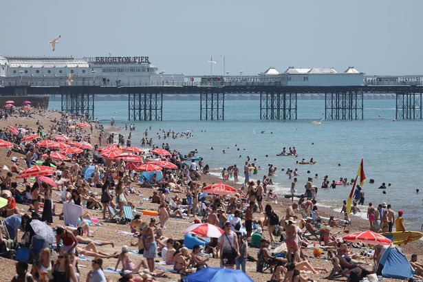 People sunbathing in Brighton during the recent heatwave
