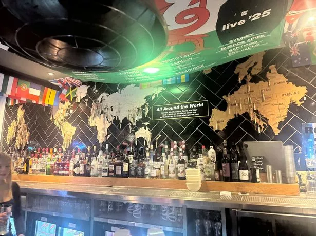A map inside the bar allows visitors to put a pin on where they have visited from