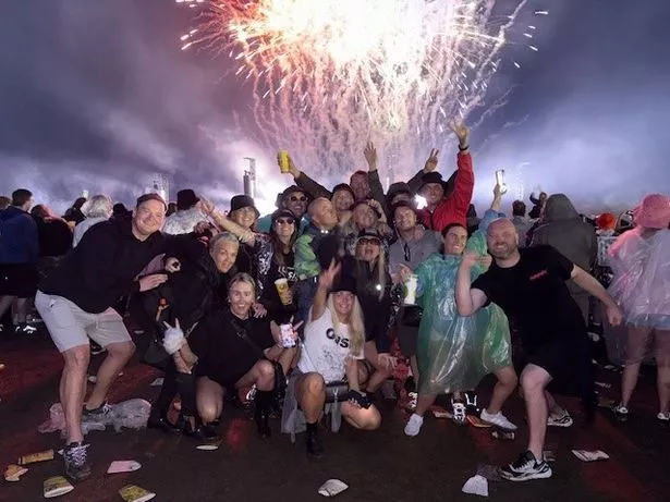 Hayley Murphy (top centre) with a group of friends at Sunday's Oasis gig at Heaton Park