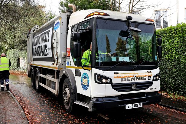 Belfast City Council black bin collection - stock image
