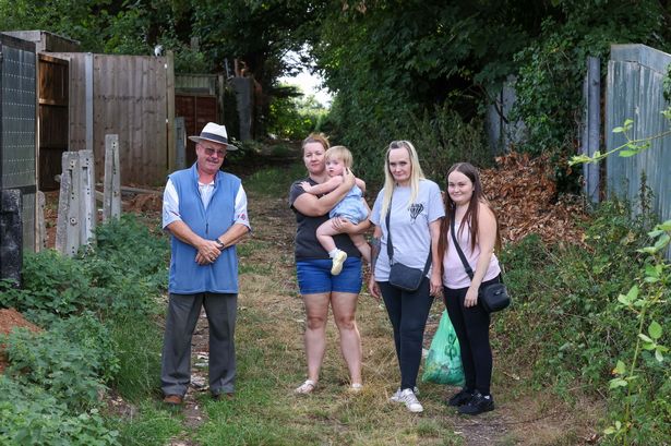 Residents of Belroyal Avenue in Broomhill Bristol, Friday 18 July  2025  who are up in arms with excessive fly tipping (including a boat) in the lane behind their homes