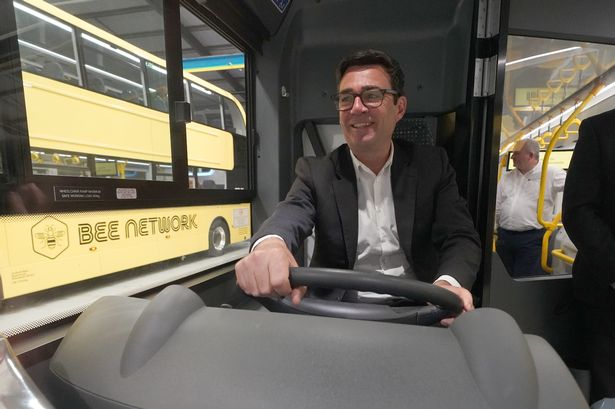 Greater Manchester mayor Andy Burnham views the 'Bee Network' buses at manufacturer Alexander Dennis in Larbert, Falkirk