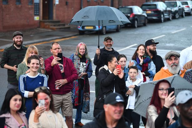 People at the unveiling of the statue in 2021