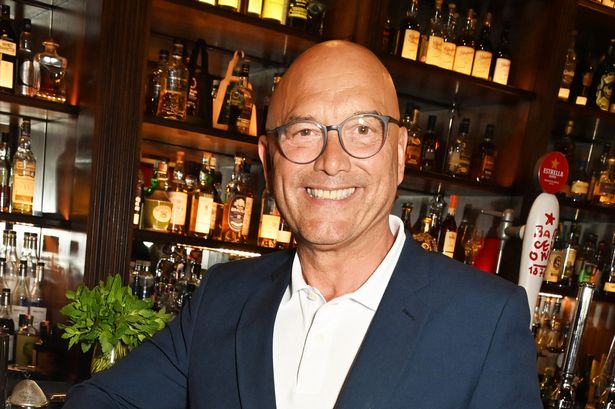 Gregg Wallace in a blue suit.