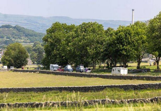Campervans and motorhomes in road near Castleton