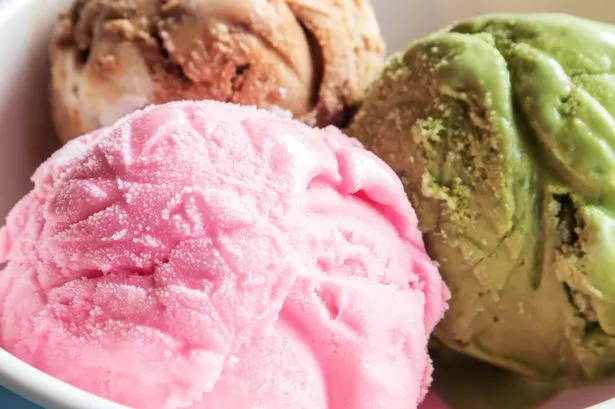 Closeup ice cream strawberry, green tea, chocolate in a bowl 
