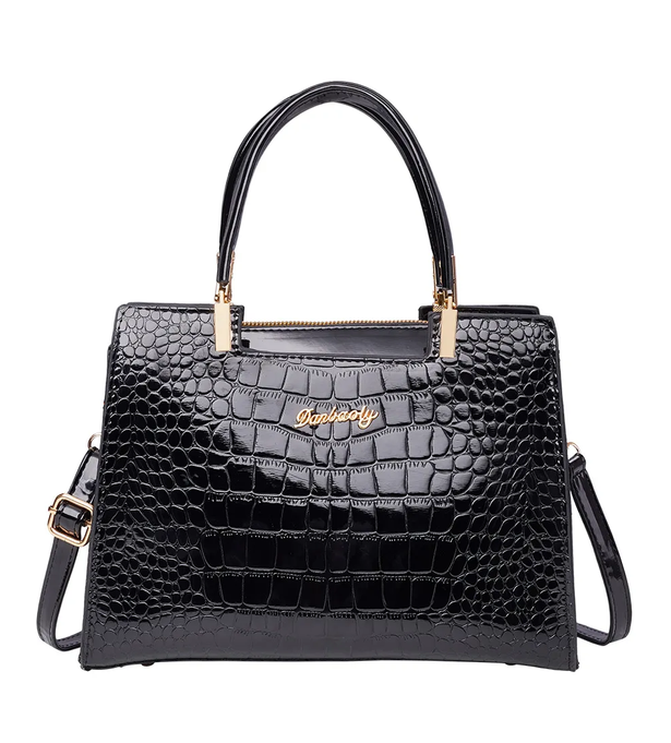 The £20 bag looks a lot like a £700 version worn by Kate Middleton