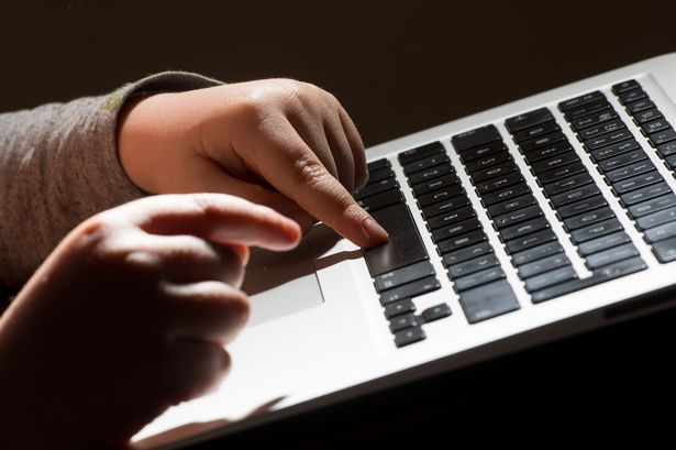 A child using a laptop