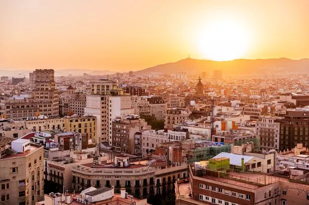Barcelona skyline at sunset, aerial view, Catalonia, Spain