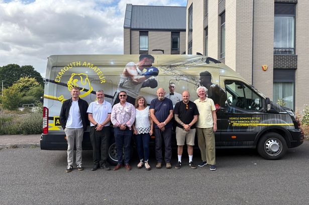 Exmouth Amateur Boxing Club president Robert Toome (third from left) with supporters after securing the go-ahead for a new boxing gym.