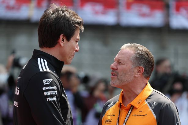Toto Wolff, Executive Director of Mercedes AMG Petronas F1 Team and Zak Brown, Chief Executive Officer of McLaren talk in the Paddock prior to the F1 Grand Prix of China at Shanghai International Circuit