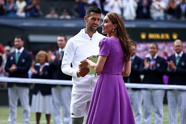 Novak Djokovic speaks to the Princess of Wales after receiving his runner-up trophy at Wimbledon 2024
