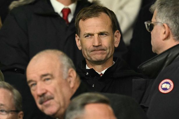 Manchester United's sporting director, Dan Ashworth (C) takes his seat for the UEFA Europa  League, League Phase football match between Manchester United and Bodoe/Glimt at Old Trafford stadium in Manchester