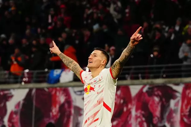 Benjamin Sesko celebrates after scoring for RB Leipzig.