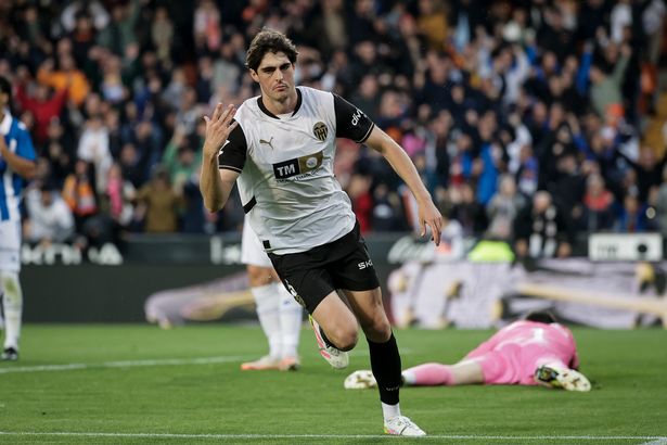 Javi Guerra celebrates after scoring for Valencia.