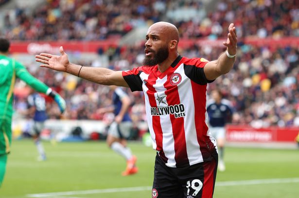 Bryan Mbeumo appeals a decision while in action for Brentford.