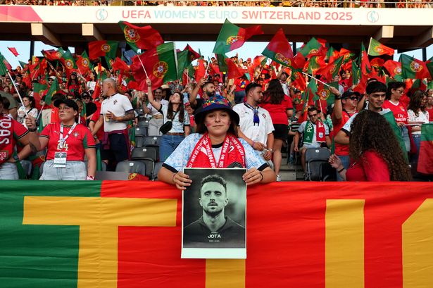 BERN, SWITZERLAND - JULY 03: Fans of Portugal hold up a photograph of Diogo Jota in tribute to Portugal football player Diogo Jota who passed away on the 3rd of July 2025, prior to during the UEFA Women's EURO 2025 Group B match between Spain and Portugal at Stadion Wankdorf on July 03, 2025 in Bern, Switzerland. (Photo by Daniela Porcelli/Getty Images)
