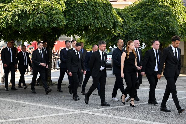 Players, Coaching Staff and Representatives of Liverpool FC arrive at a funeral held for Diogo Jota 