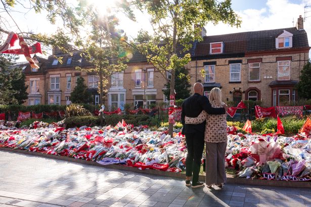 LIVERPOOL, ENGLAND - JULY 08: Arne Slot, head coach and his wife paying tribute to Diogo Jota at Anfield on July 08, 2025 in Liverpool, England. The Liverpool player and Portugal international Diogo Jota, 28, was killed in a car crash on July 03 in Zamora, Spain. He was travelling with his brother Andre Silva before returning to the UK for the start of the Premier League season. (Photo by Nikki Dyer - LFC/Liverpool FC via Getty Images)