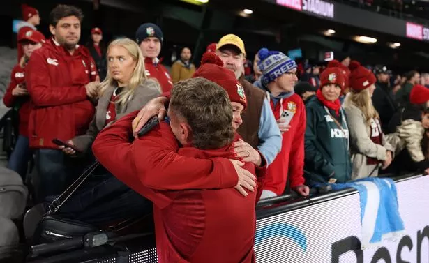 Darcy Graham of the British & Irish Lions is consoled by friends and family 