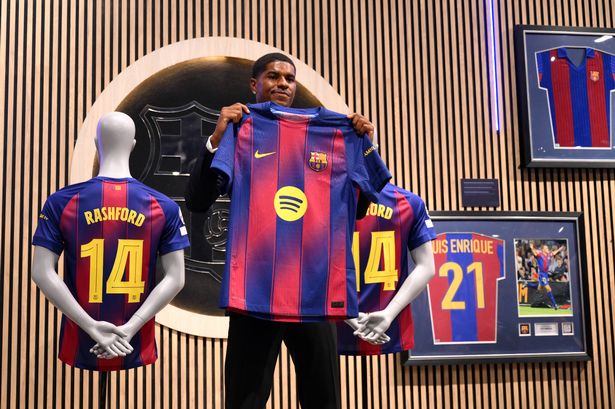 BARCELONA, SPAIN - JULY 23: Marcus Rashford of FC Barcelona holds up his shirt during the Unveiling of New Signing Marcus Rashford, after the announcement of a season-long loan move from Manchester United to FC Barcelona, at Camp Nou on July 23, 2025 in Barcelona, Spain. (Photo by David Ramos/Getty Images)