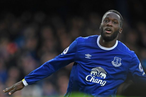 Everton's Belgian striker Romelu Lukaku celebrates after scoring their third goal during the English Premier League football match between Everton and Hull City at Goodison Park in Liverpool, north west England on March 18, 2017. / AFP PHOTO / Paul ELLIS / RESTRICTED TO EDITORIAL USE. No use with unauthorized audio, video, data, fixture lists, club/league logos or 'live' services. Online in-match use limited to 75 images, no video emulation. No use in betting, games or single club/league/player publications.  /         (Photo credit should read PAUL ELLIS/AFP via Getty Images)