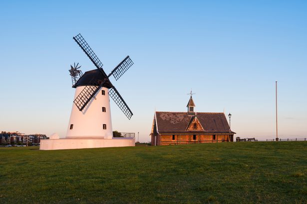 Lytham St Annes Windmill, illuminated with golden light