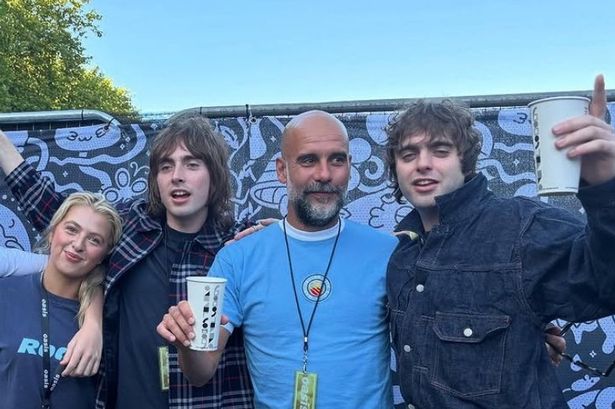 Manchester City manager Pep Guardiola has been spotted backstage at the Oasis Heaton Park gig