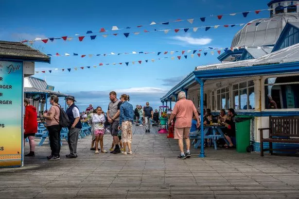 The pier is full of old fashioned seaside charm
