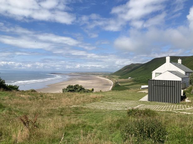 Only a sprinkling of homes in the village, some with an outstanding sea view