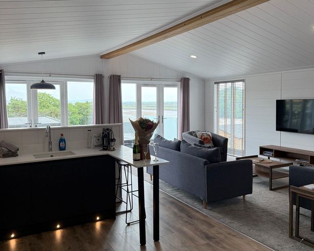 Open-plan kitchen lounge diner inside the lodge at Dylan Coastal Resort, Laugharne 