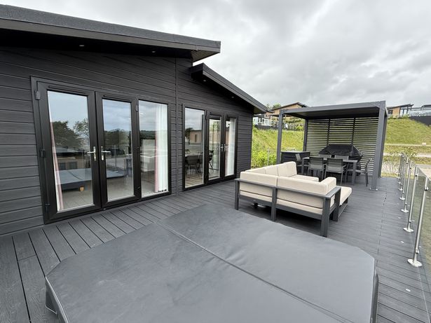 Outside of one of the lodges at Dylan Coastal Resort, Laugharne