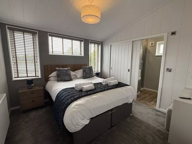 Ensuite principal bedroom inside a lodge at Dylan Coastal Resort, Laugharne
