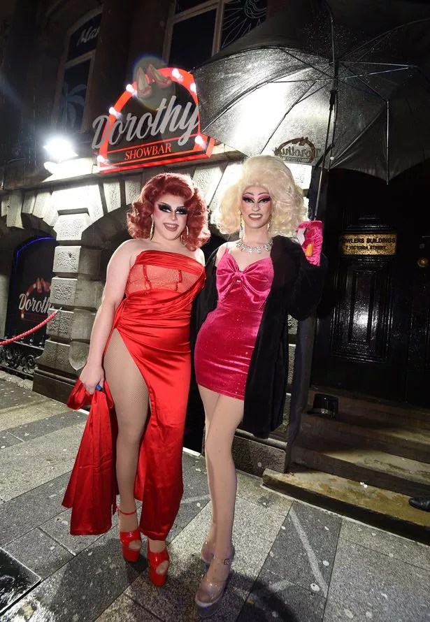 Celebrating New Years Eve outside Dorothys Showbar on Victoria Street.