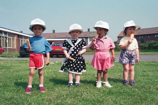 Young primary schoolchildren left to right: Thomas, Sonia and Helen get their first lick of the revived Twicer ice lolly made by Pendleton's at the Kirkby Unemployed Centre creche. June 30, 1993