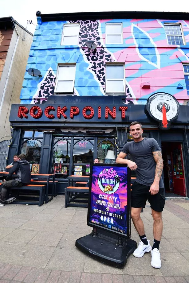 Connor Hilton from New Brighton's Hella Dough Pizza is found inside Rockpoint records