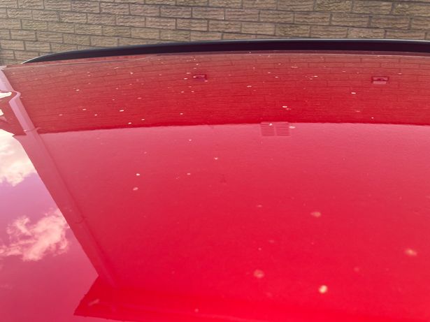 A car roof was left covered in the yellow markings.