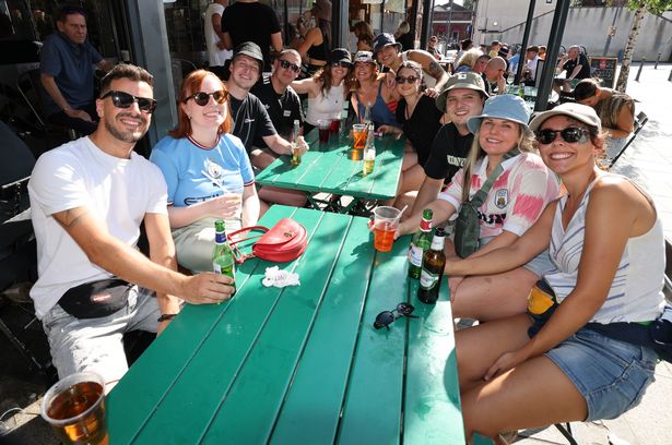 Oasis fans enjoying the sunshine in Prestwich ahead of the Oasis Reunion tour concert at Heaton Park
