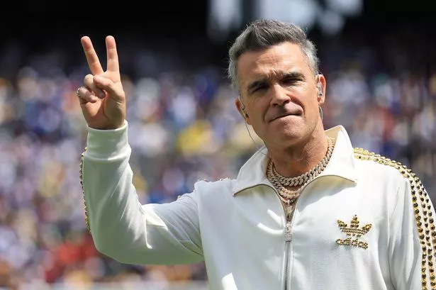 Robbie Williams performs prior to the FIFA Club World Cup 2025 Final match between Chelsea FC and Paris Saint-Germain 