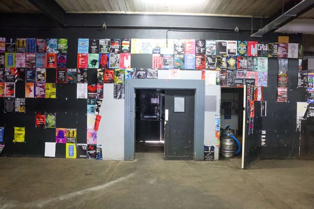Posters line the walls from Motion events that have come before