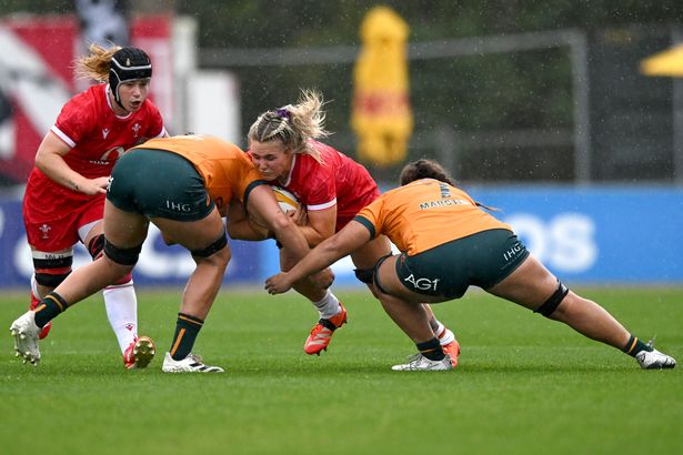 Alex Callender of Wales takes on the defence during the match between Australian Wallaroos and Wales Women